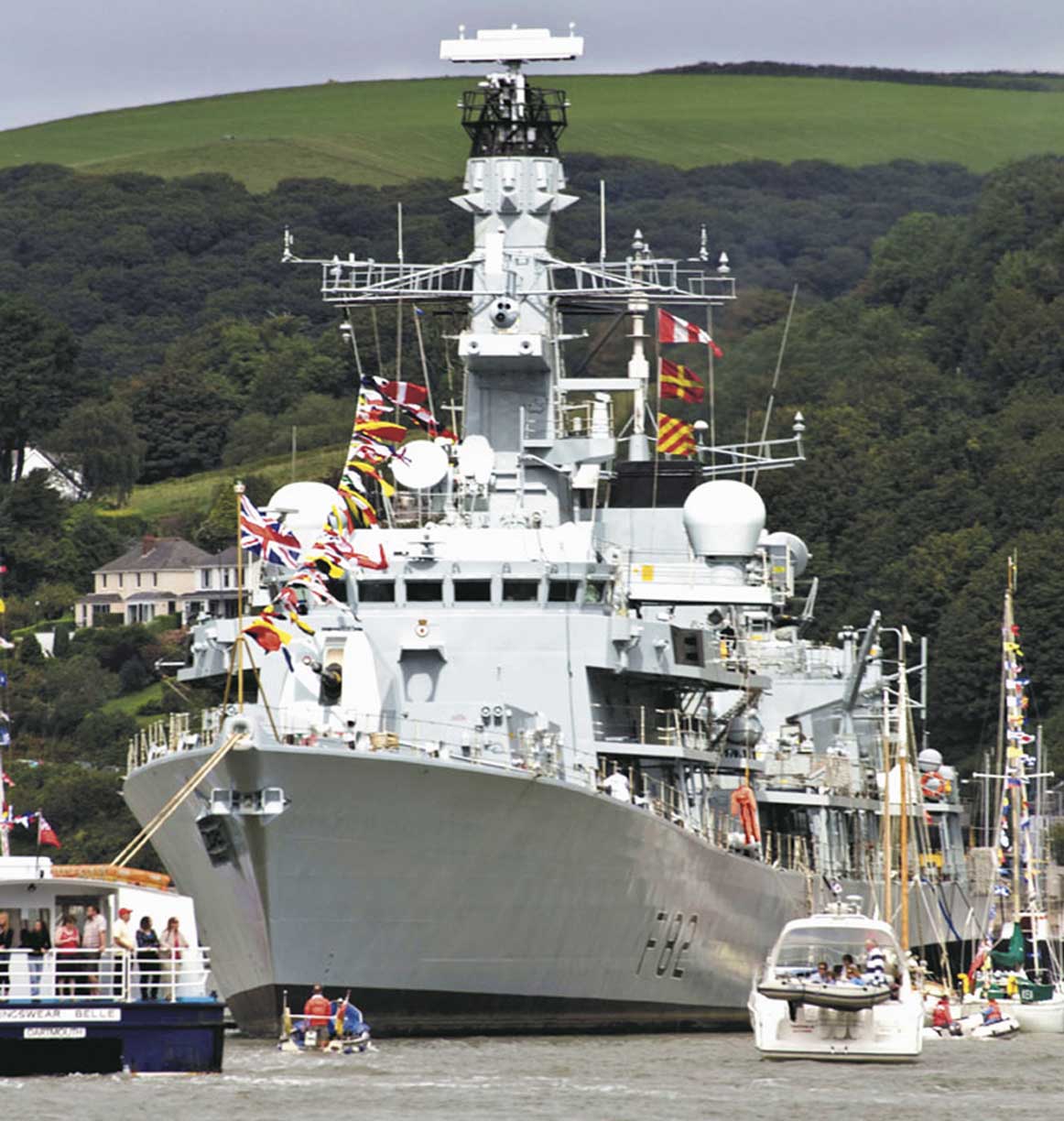 The frigate HMS Somerset showing the flag in home waters. Photo: Nigel Andrews.